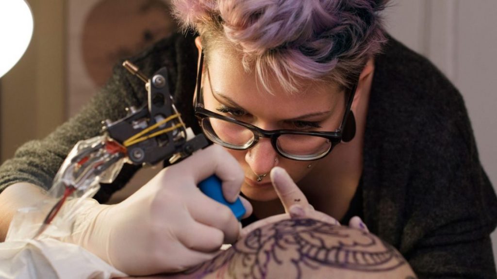 Tattoo Artist Female 1296x728 Header 1296x728 1024x575 - What Must Be Known Before Having A Tattoo